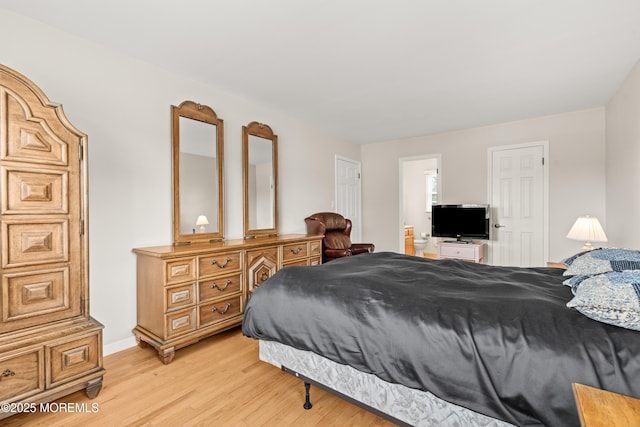 24 Sugar Maple Dr, Red Bank, NJ 07701 - bedroom featuring light wood-style flooring and connected bathroom