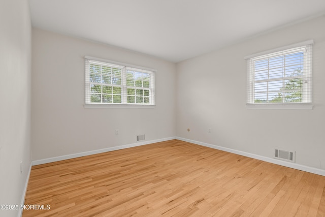 24 Sugar Maple Dr, Red Bank, NJ 07701 - empty room with light wood-type flooring and baseboards