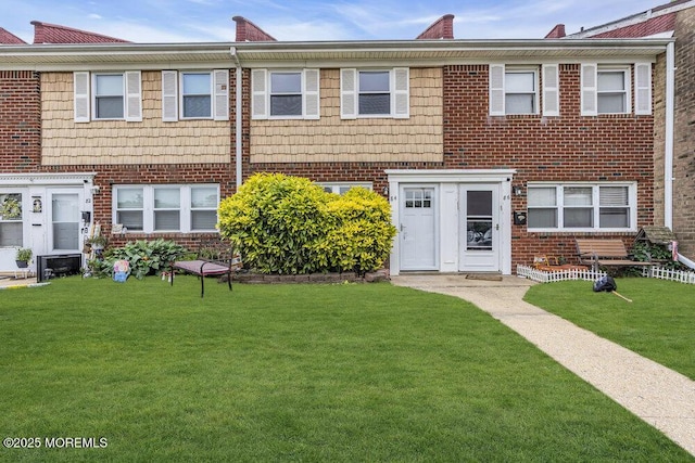 84 Briar Mills Dr, Brick, NJ 08724 - multi unit property with a front lawn and brick siding