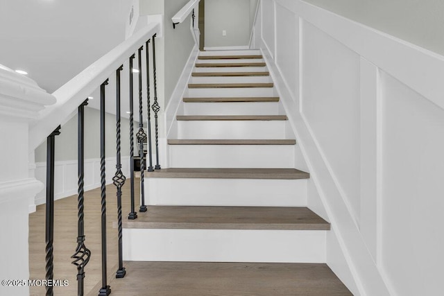 84 Briar Mills Dr, Brick, NJ 08724 - stairway with a decorative wall and wood finished floors
