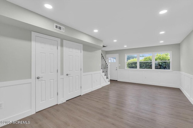 84 Briar Mills Dr, Brick, NJ 08724 - basement featuring a wainscoted wall, stairs, a decorative wall, wood finished floors, and recessed lighting