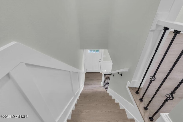 84 Briar Mills Dr, Brick, NJ 08724 - staircase with wood finished floors and baseboards