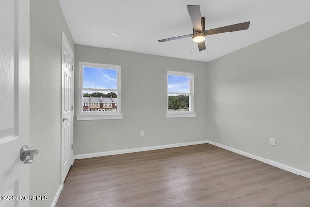 84 Briar Mills Dr, Brick, NJ 08724 - spare room with plenty of natural light, baseboards, and wood finished floors