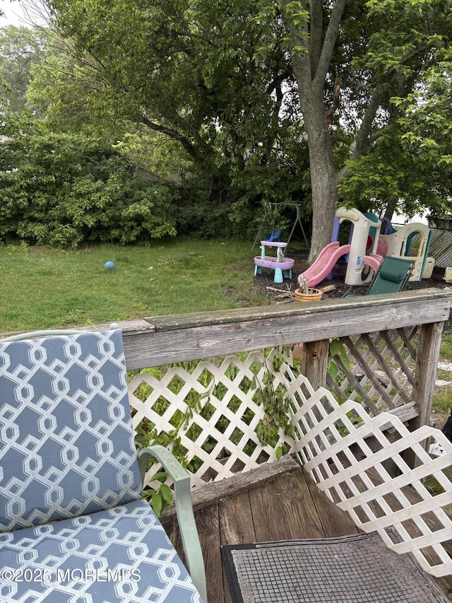 321 Green Tree Rd, Brick, NJ 08724 - wooden deck with a playground and a lawn