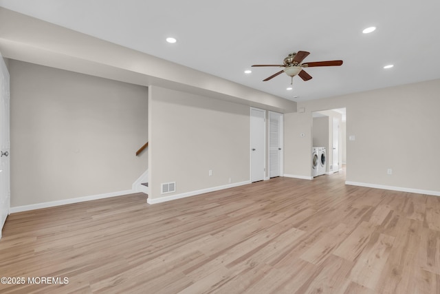 34-1 Green Grove Ave, Keyport, NJ 07735 - spare room featuring washing machine and dryer, ceiling fan, light wood-style flooring, recessed lighting, and stairway