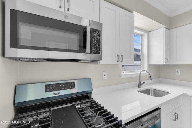 34-1 Green Grove Ave, Keyport, NJ 07735 - kitchen with appliances with stainless steel finishes, white cabinets, and light countertops