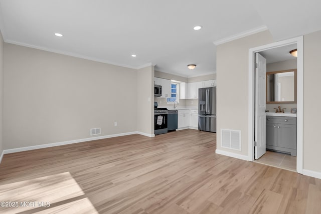 34-1 Green Grove Ave, Keyport, NJ 07735 - unfurnished living room with light wood-type flooring, recessed lighting, and crown molding