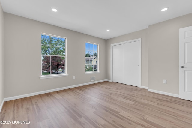 34-1 Green Grove Ave, Keyport, NJ 07735 - unfurnished bedroom with light wood-style floors, a closet, and recessed lighting