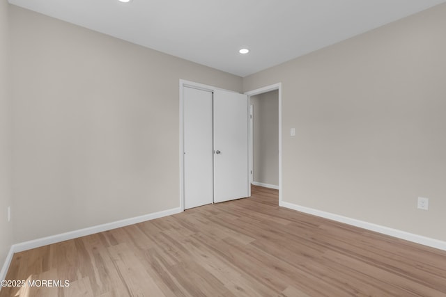 34-1 Green Grove Ave, Keyport, NJ 07735 - unfurnished bedroom featuring light wood-style floors, a closet, and recessed lighting