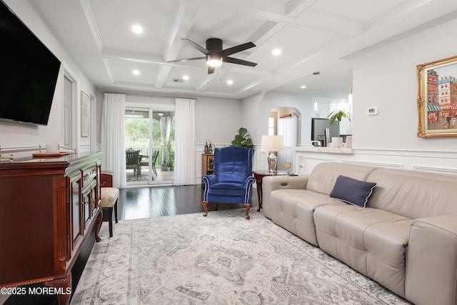 8 Clement Ln, Leonardo, NJ 07737 - living room featuring ceiling fan, coffered ceiling, arched walkways, wood finished floors, and beam ceiling