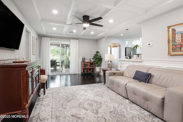 8 Clement Ln, Leonardo, NJ 07737 - living room featuring a ceiling fan, wood finished floors, coffered ceiling, arched walkways, and beamed ceiling