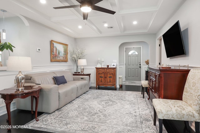 8 Clement Ln, Leonardo, NJ 07737 - living room with arched walkways, coffered ceiling, dark wood finished floors, ceiling fan, and beam ceiling