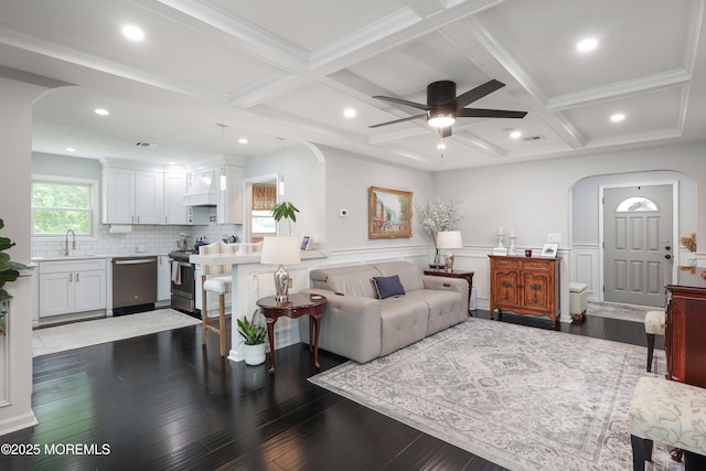 8 Clement Ln, Leonardo, NJ 07737 - living area with arched walkways, coffered ceiling, ceiling fan, dark wood finished floors, and beam ceiling