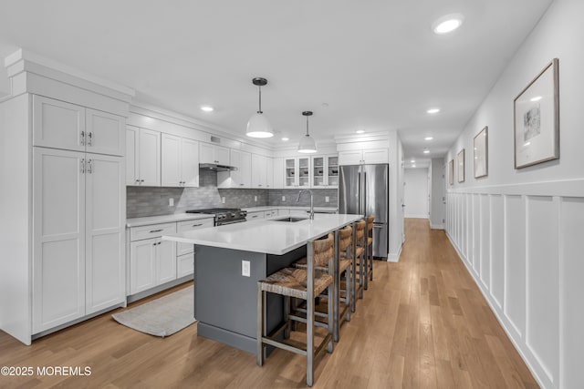 150 Ocean Ave Unit 6, Sea Bright, NJ 07760 - kitchen with stainless steel appliances, white cabinetry, light countertops, light wood-style flooring, and recessed lighting