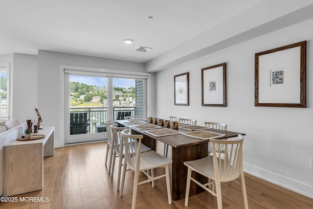 150 Ocean Ave Unit 6, Sea Bright, NJ 07760 - dining area featuring light wood-style flooring and healthy amount of natural light