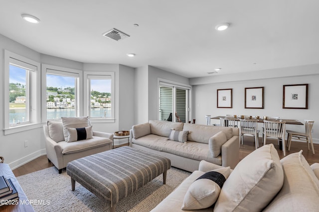 150 Ocean Ave Unit 6, Sea Bright, NJ 07760 - living area featuring wood finished floors, recessed lighting, and a water view