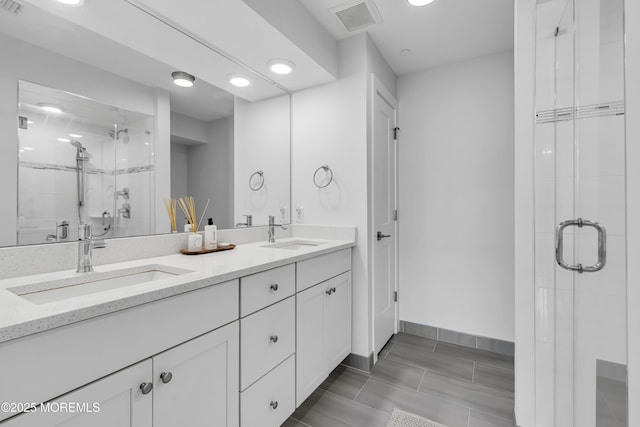 150 Ocean Ave Unit 6, Sea Bright, NJ 07760 - bathroom featuring double vanity, a shower stall, and recessed lighting