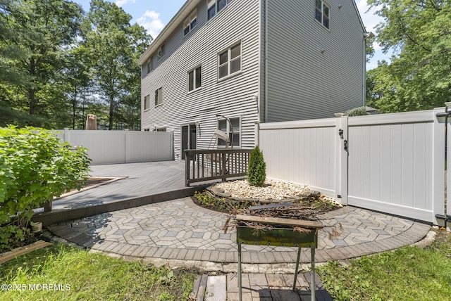 35 Lone Star Ln, Manalapan, NJ 07726 - rear view of property with a gate and a deck