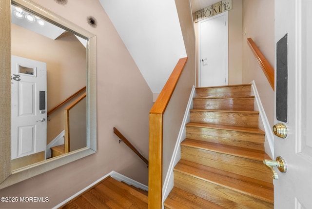 35 Lone Star Ln, Manalapan, NJ 07726 - staircase featuring wood finished floors