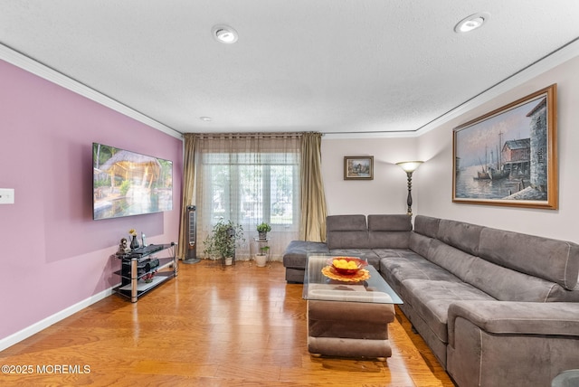 35 Lone Star Ln, Manalapan, NJ 07726 - living area featuring ornamental molding, wood finished floors, a textured ceiling, and baseboards