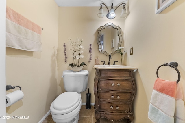 35 Lone Star Ln, Manalapan, NJ 07726 - half bathroom featuring vanity, toilet, tile patterned floors, and baseboards