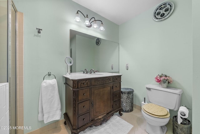 35 Lone Star Ln, Manalapan, NJ 07726 - bathroom with toilet, vanity, tile patterned flooring, and a shower with door