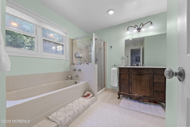 35 Lone Star Ln, Manalapan, NJ 07726 - full bathroom featuring a garden tub, tile patterned floors, a shower stall, and vanity
