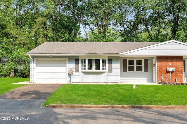 5 Oregon Dr Unit B, Whiting, NJ 08759 - ranch-style home featuring asphalt driveway, an attached garage, and a front lawn