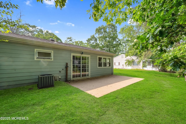 5 Oregon Dr Unit B, Whiting, NJ 08759 - rear view of property featuring cooling unit, a lawn, and a patio area