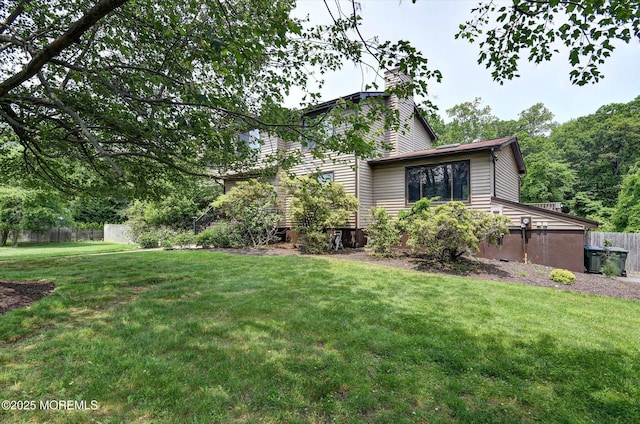19 Northwoods Rd, Ocean Twp, NJ 07712 - view of front of property with a chimney