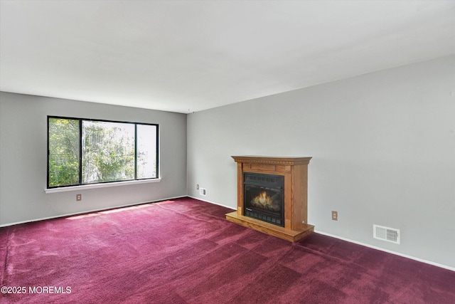 19 Northwoods Rd, Ocean Twp, NJ 07712 - unfurnished living room with carpet flooring and a glass covered fireplace