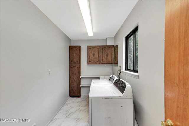 19 Northwoods Rd, Ocean Twp, NJ 07712 - laundry room featuring washer and dryer, cabinet space, and light marble finish flooring