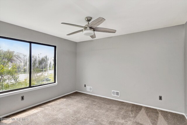 19 Northwoods Rd, Ocean Twp, NJ 07712 - carpeted spare room featuring baseboards and ceiling fan