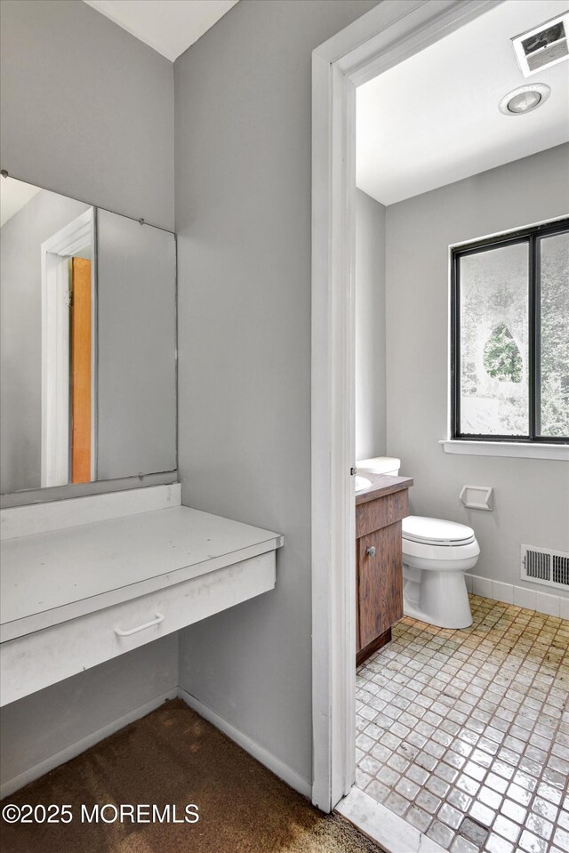 19 Northwoods Rd, Ocean Twp, NJ 07712 - bathroom with vanity and baseboards