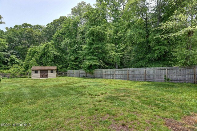 19 Northwoods Rd, Ocean Twp, NJ 07712 - fenced backyard featuring a storage shed