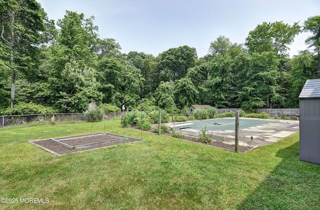 19 Northwoods Rd, Ocean Twp, NJ 07712 - fenced backyard with a vegetable garden and a shed