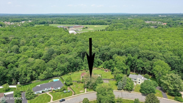 19 Northwoods Rd, Ocean Twp, NJ 07712 - view of property location featuring a heavily wooded area
