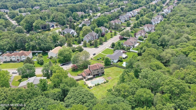 19 Northwoods Rd, Ocean Twp, NJ 07712 - view of property location with nearby suburban area and a heavily wooded area