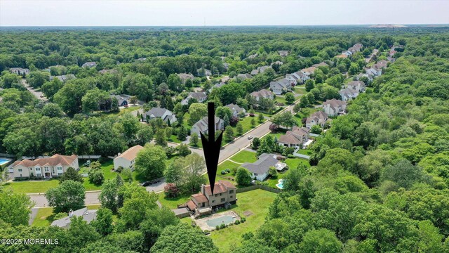 19 Northwoods Rd, Ocean Twp, NJ 07712 - aerial perspective of suburban area with a heavily wooded area