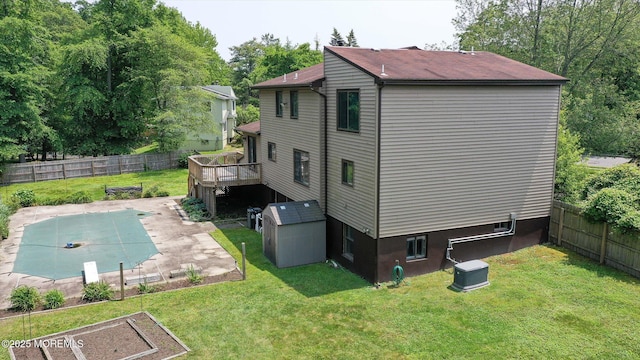 19 Northwoods Rd, Ocean Twp, NJ 07712 - view of property exterior featuring a fenced backyard, a wooden deck, and a patio area