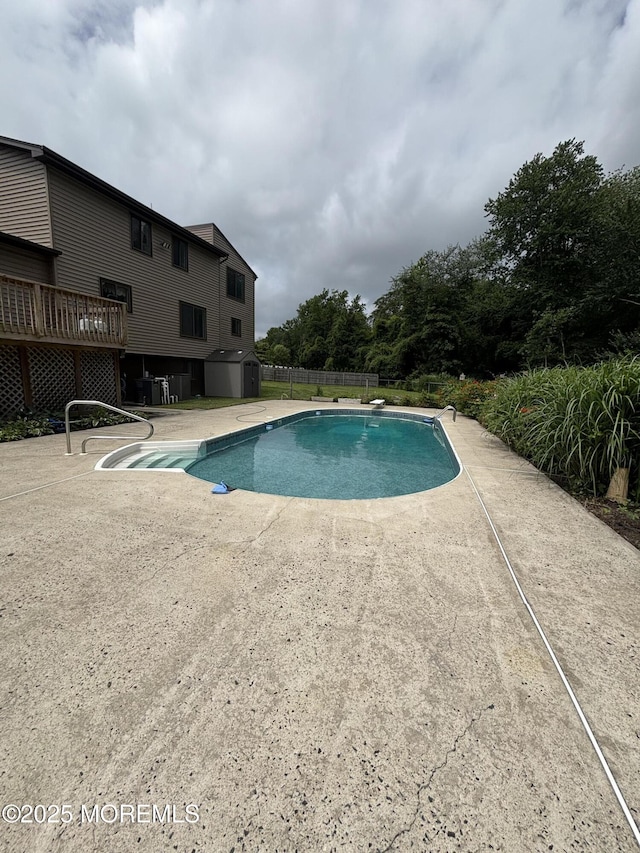 19 Northwoods Rd, Ocean Twp, NJ 07712 - outdoor pool featuring a patio area