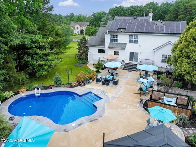 3 Kindling Way, Jackson, NJ 08527 - view of pool with outdoor dining area, a patio area, a fenced backyard, an outdoor hangout area, and view of scattered trees