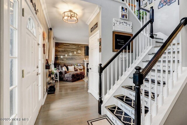 3 Kindling Way, Jackson, NJ 08527 - foyer entrance with ornamental molding, stairs, wood finished floors, and wooden walls