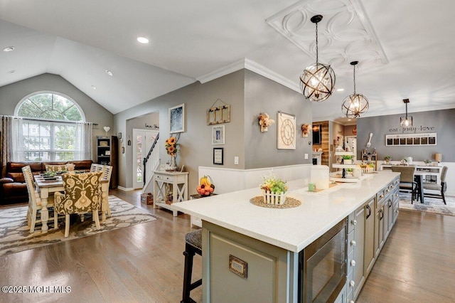 3 Kindling Way, Jackson, NJ 08527 - kitchen with open floor plan, black microwave, wood finished floors, light countertops, and lofted ceiling