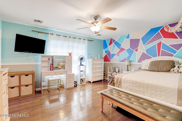 3 Kindling Way, Jackson, NJ 08527 - bedroom featuring wallpapered walls, an accent wall, hardwood / wood-style flooring, and a ceiling fan