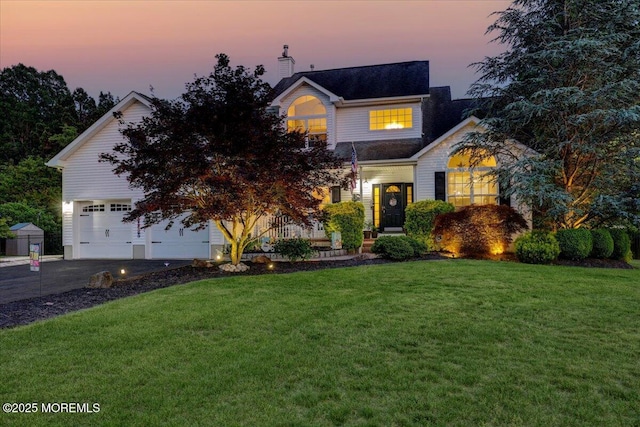 3 Kindling Way, Jackson, NJ 08527 - view of front facade with a front lawn, a chimney, and asphalt driveway
