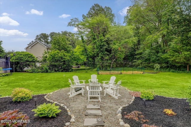 3 Kindling Way, Jackson, NJ 08527 - view of yard with a trampoline and an outdoor fire pit