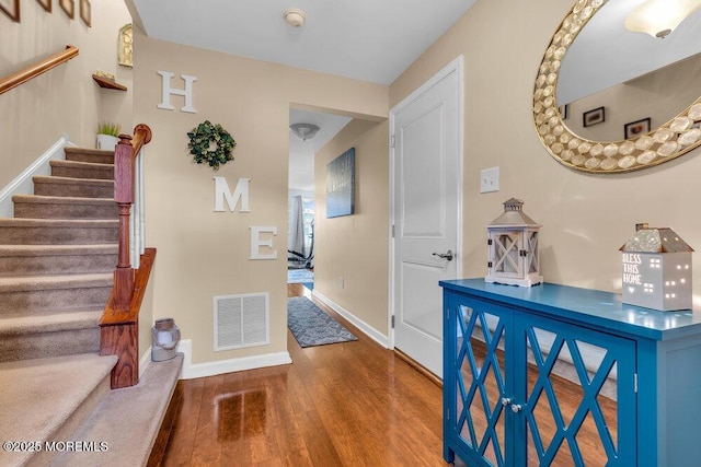 9 Olivia Dr, Tinton Falls, NJ 07712 - hall with wood finished floors and stairs