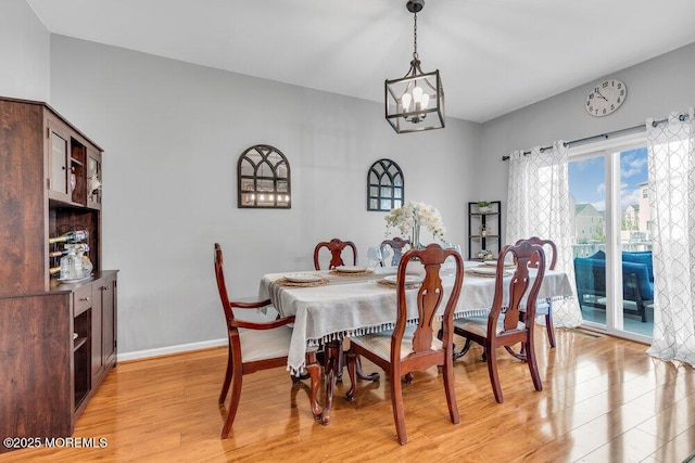 9 Olivia Dr, Tinton Falls, NJ 07712 - dining space featuring light wood finished floors and a chandelier