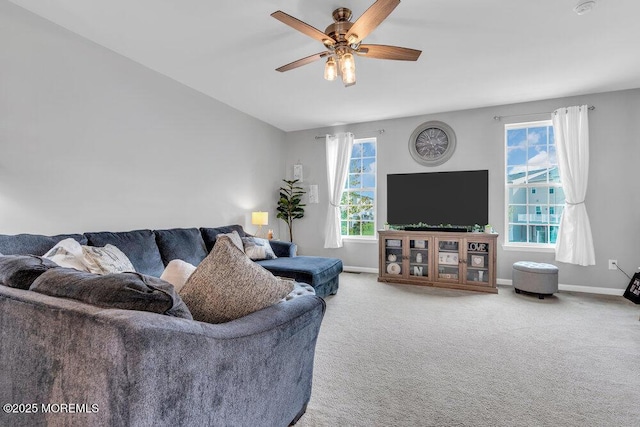 9 Olivia Dr, Tinton Falls, NJ 07712 - carpeted living room featuring baseboards and a ceiling fan